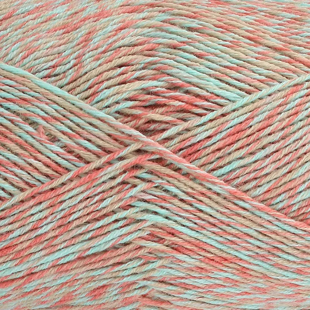 Close-up of King Cole Jamboree dk yarn in shade Lollipop Lane, with peach and blue tones.