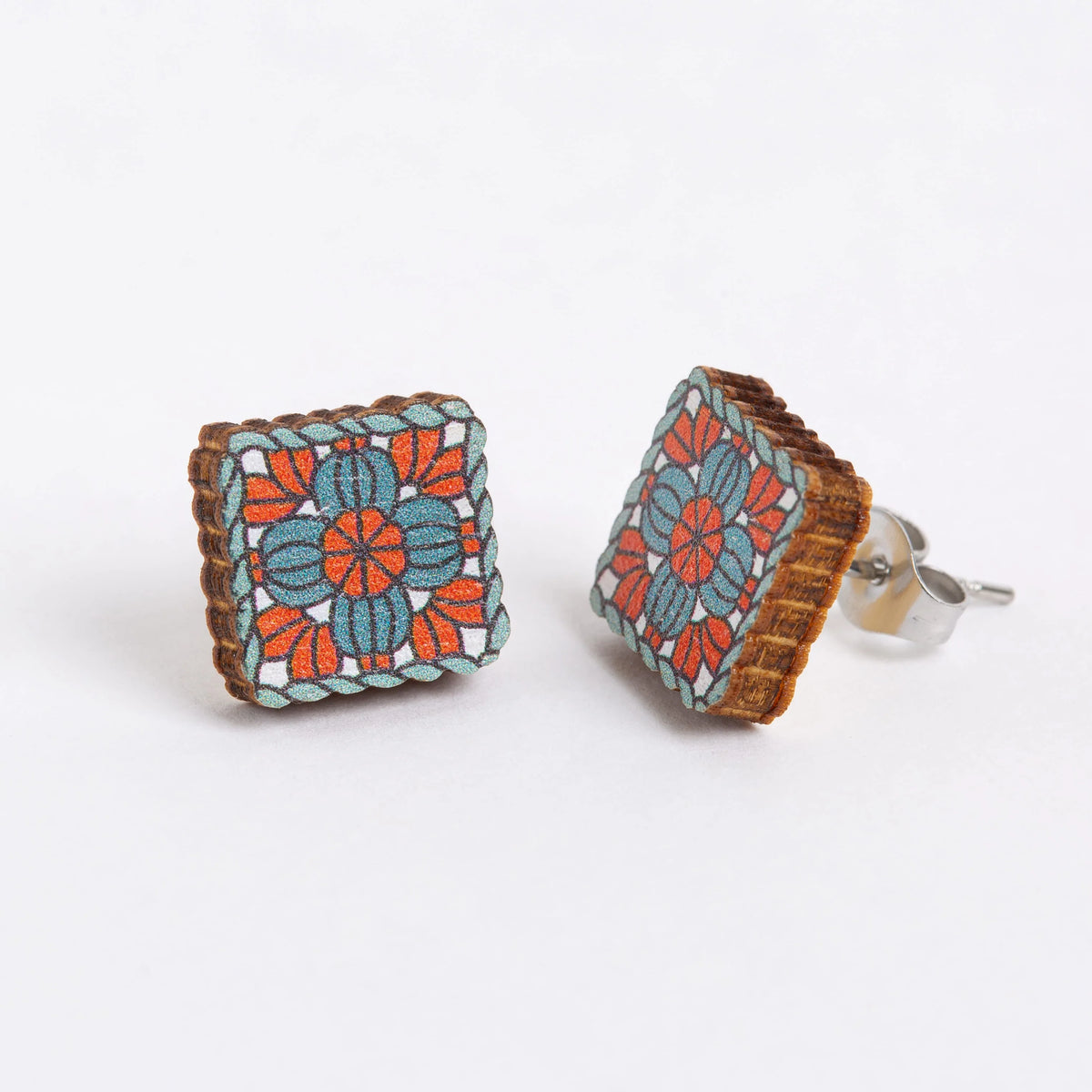 Granny square patterned earrings on a white background