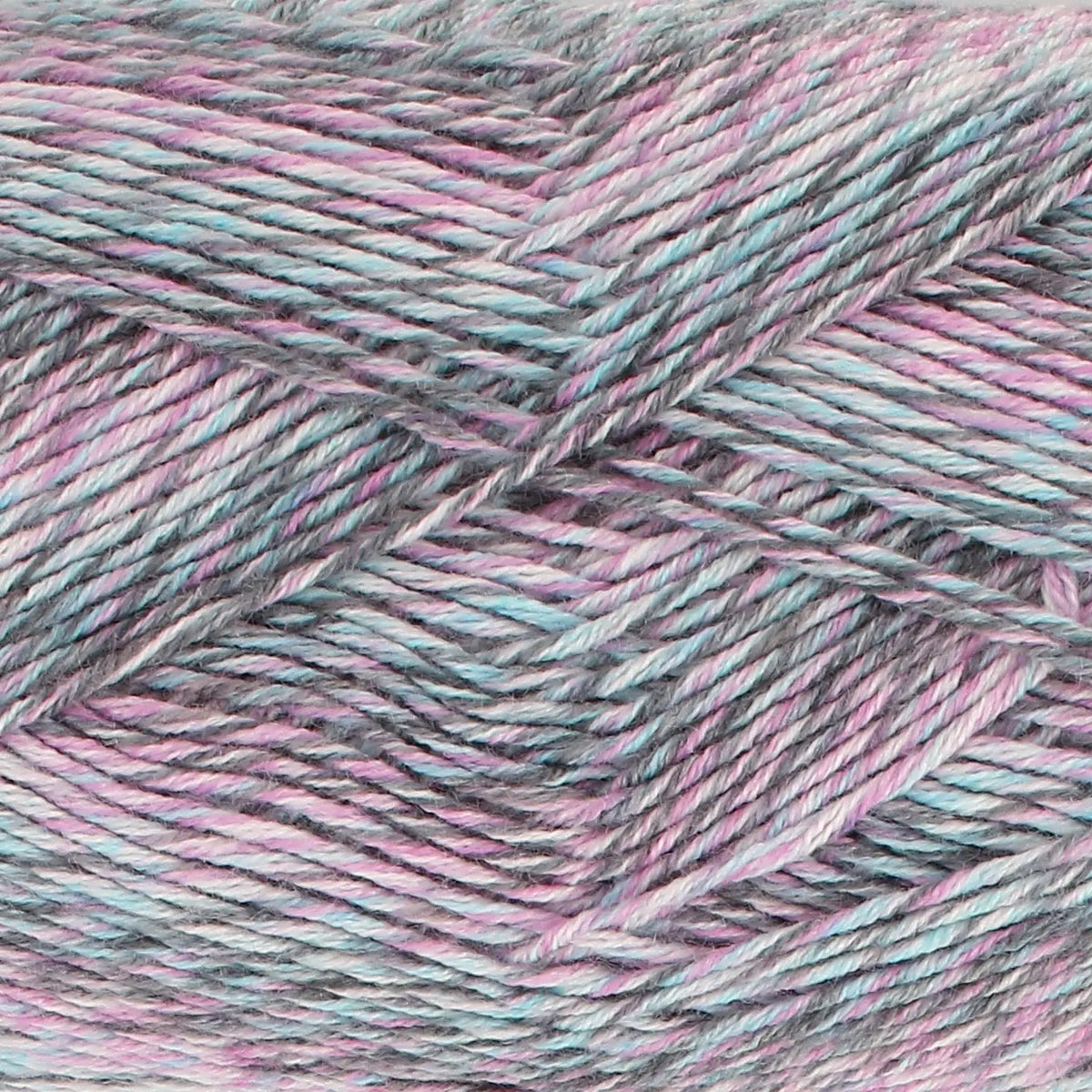 Close-up of King Cole Jamboree dk yarn in shade Midnight Masquerade, with pink, grey, and blue tones.