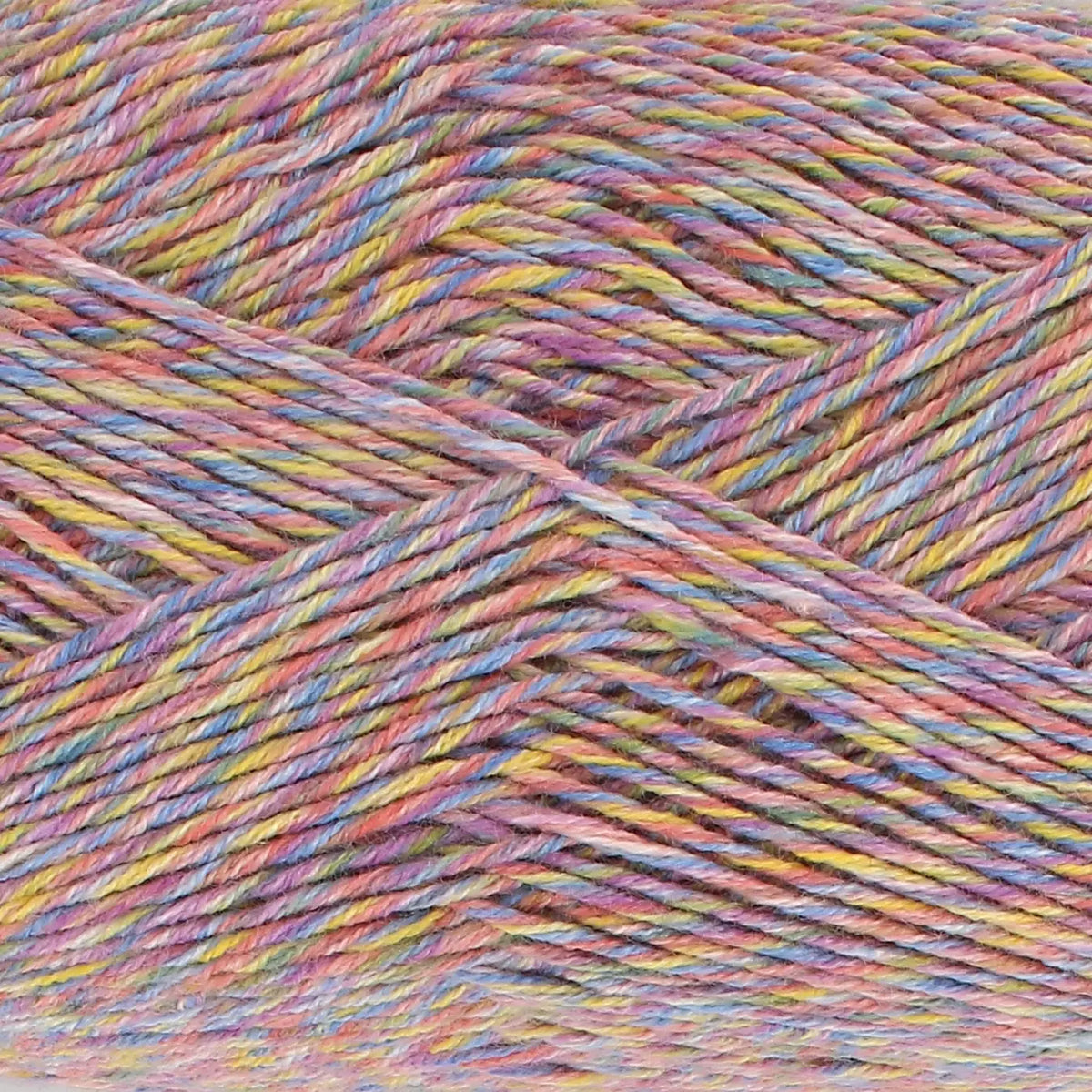 Close-up of King Cole Jamboree dk yarn in shade Samba Spectacle with purple, yellow, and blue tones.