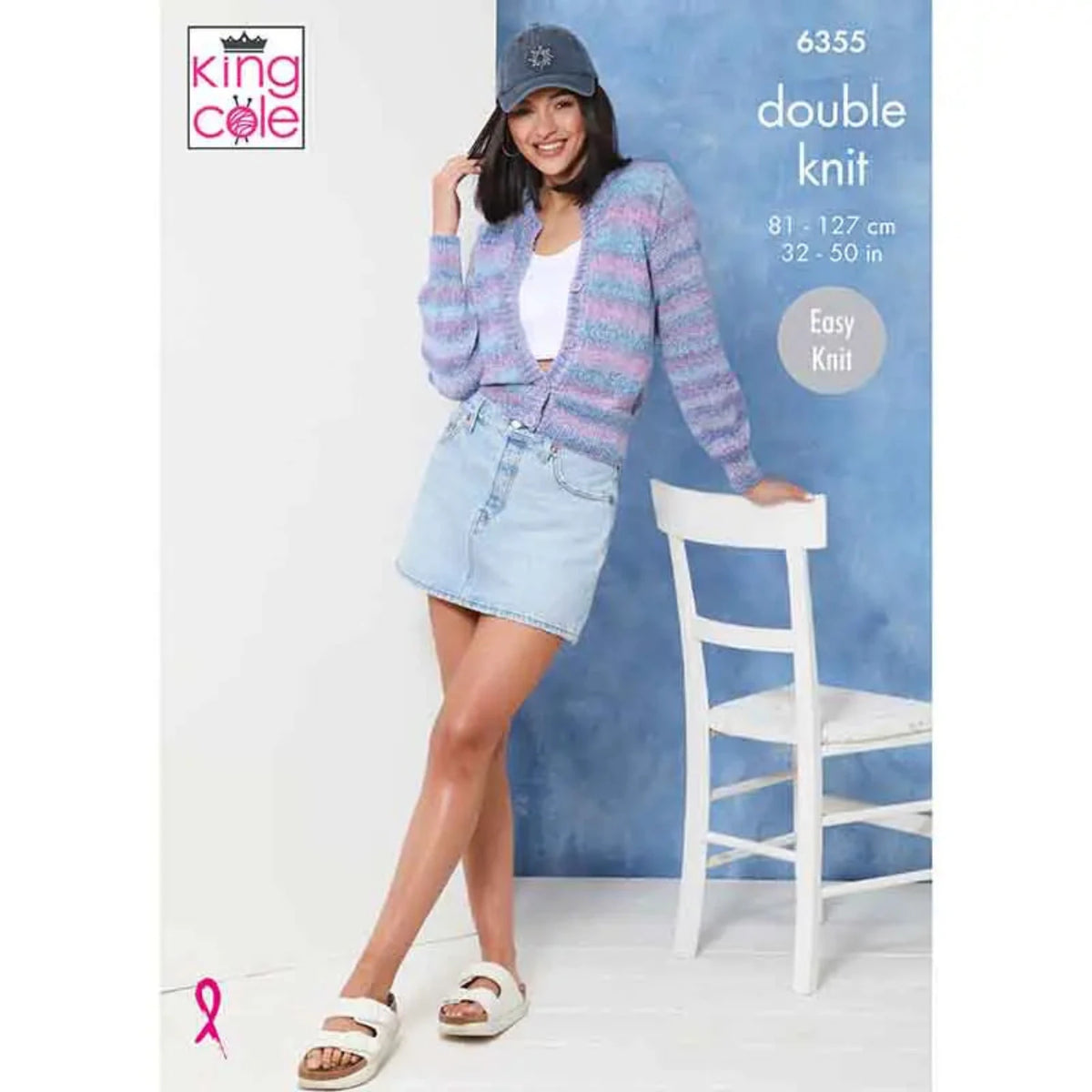 An easy knit pattern from King Cole. This is pattern 6355 and shows a lady in a cap, knitted cardigan in King Cole Jamboree yarn, a denim skirt and sandals. She is leaning against a chair.