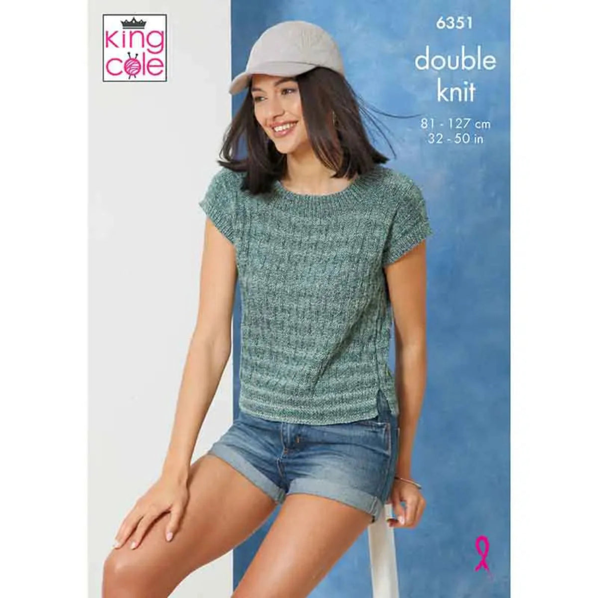 Woman wearing a green knitted top and denim shorts. The top is knitted in King Cole Jamboree dk yarn. The text reads 6351, double knit, 81-127 cm, 32-50 in.