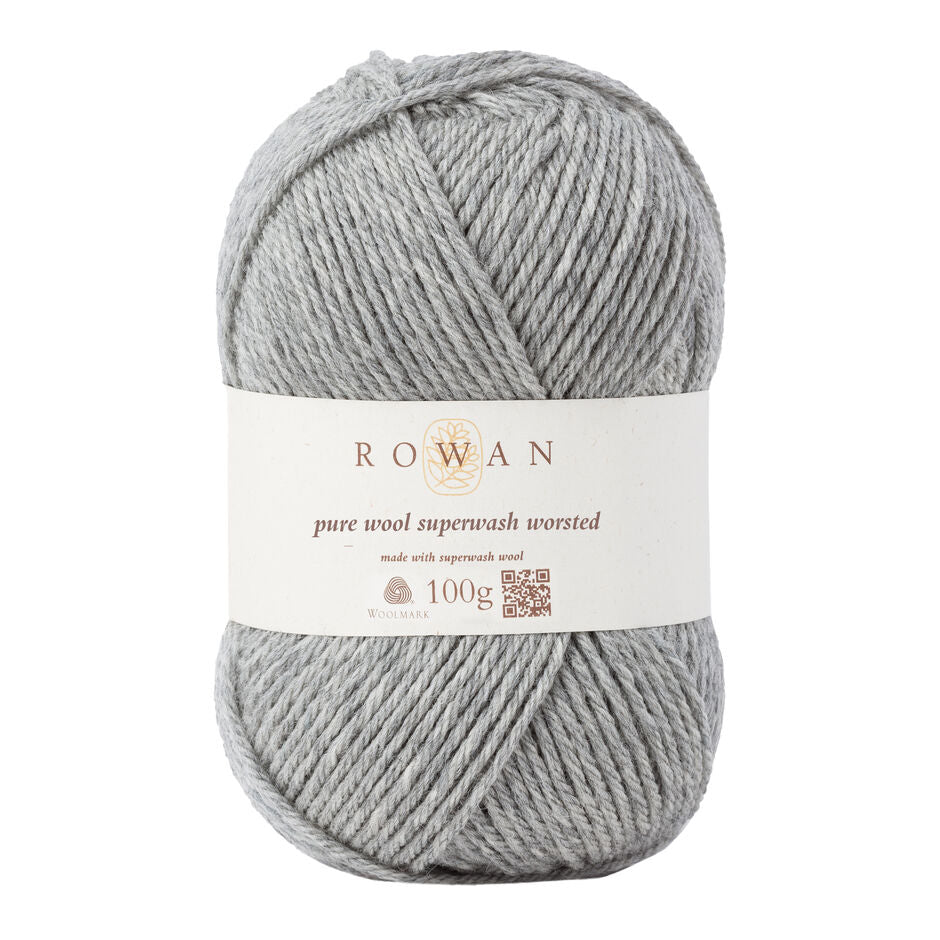 A ball of Rowan Pure Wool Superwash Worsted weight yarn, in shade Moonstone 112, against a white background.