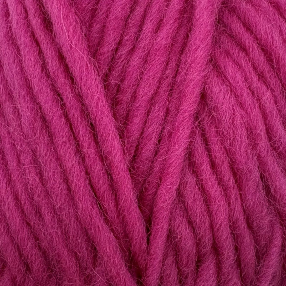 close up image of Stylecraft Floki super chunky yarn in shade Hot Pink 5571.