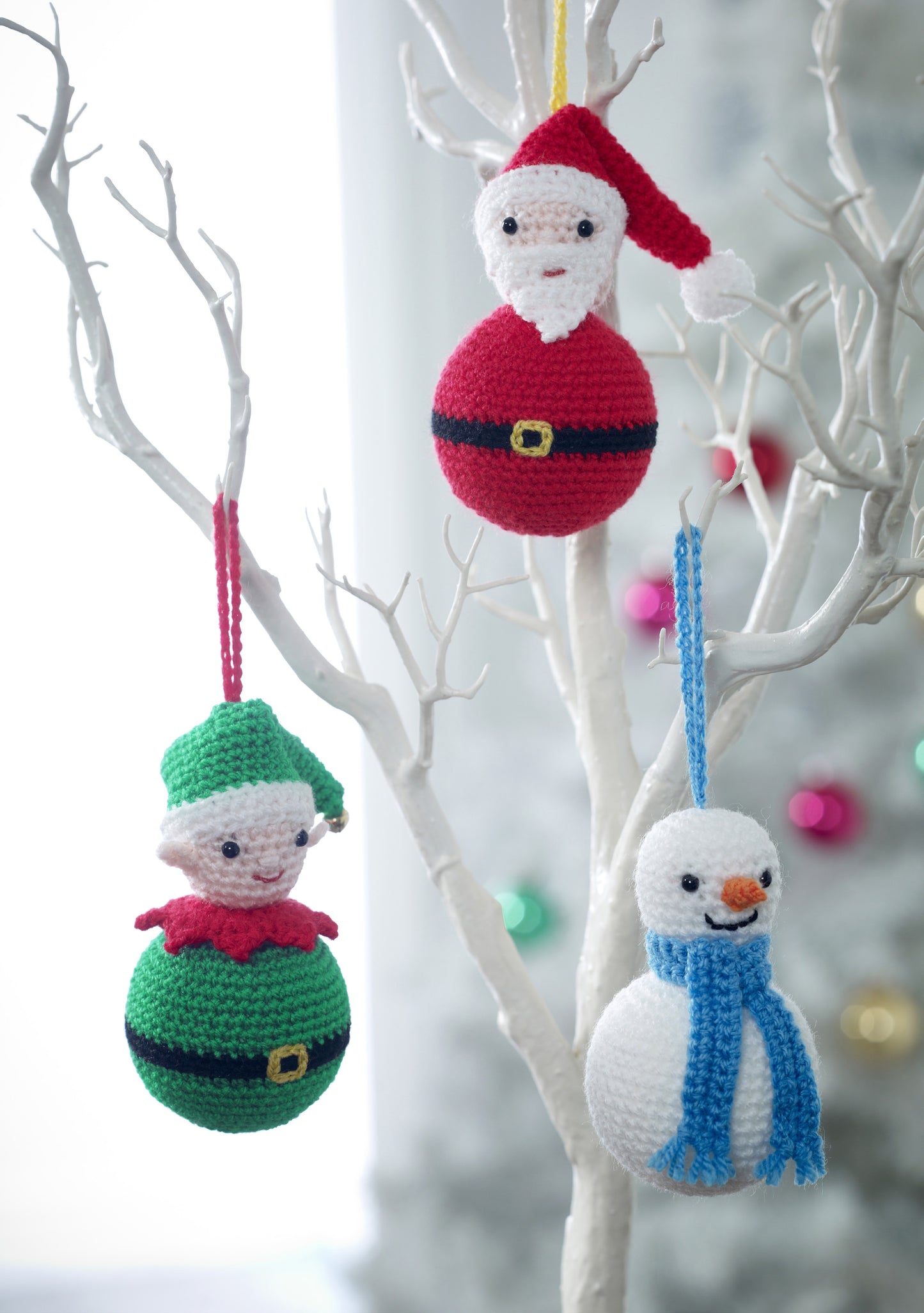 Santa, snowman and elf baubles. All approximately 7cm in diameter, perfect for decorating the tree.